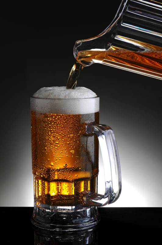 Mug of Beer and Pitcher Pour